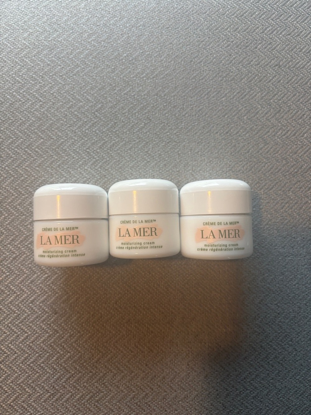 La Mer: three empty jars (0.5 ounces each)